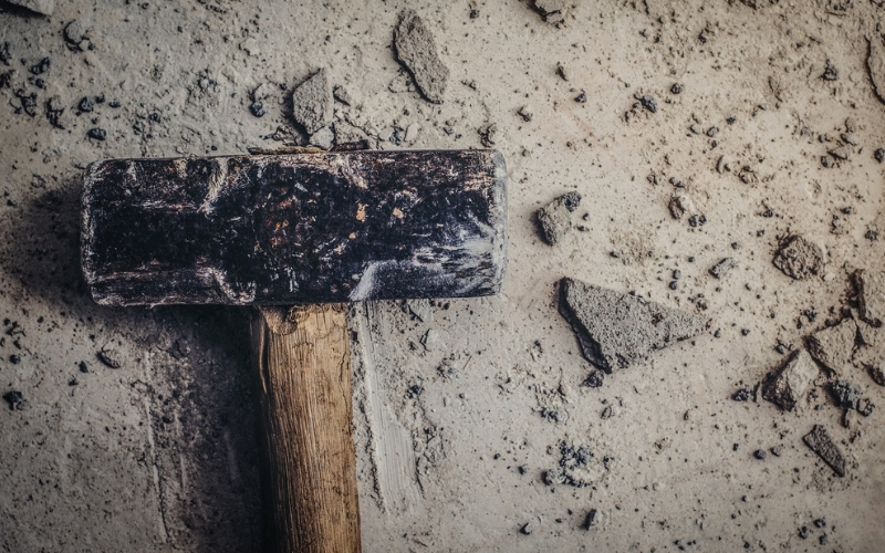 sledge hammer during general demolition services